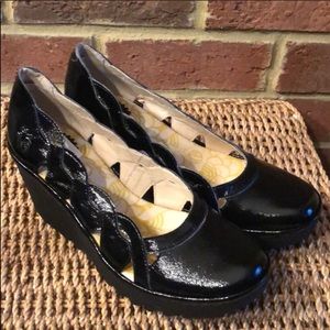 New FLY London Yelk woven detail slip on shoes.